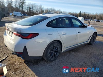 Trzecie zdjęcie samochodu z tyłu: 2023 BMW I4 EDRIVE35 GRAN COU VIN:WBY43AW01PFP94003 - miniatura