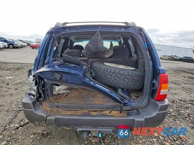 Zdjęcie 6 z 12 samochodu: 2000 JEEP GRAND CHEROKEE LAREDO VIN:1J4GW48S8YC211039 - miniatura