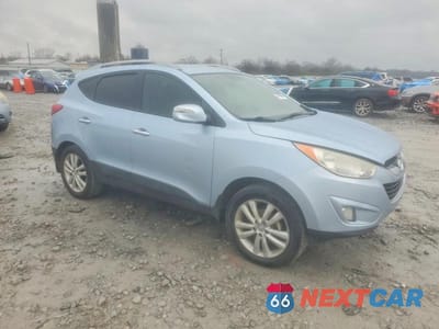 Czwarte zdjęcie samochodu z boku: 2011 HYUNDAI TUCSON GLS VIN:KM8JU3ACXBU297028 - miniatura