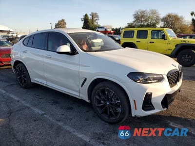 Czwarte zdjęcie samochodu z boku: 2024 BMW X4 XDRIVE30I VIN:5UX33DT09R9V07767 - miniatura