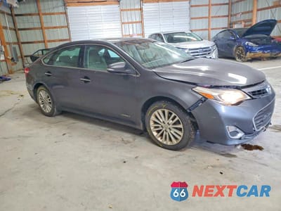 Czwarte zdjęcie samochodu z boku: 2014 TOYOTA AVALON HYBRID VIN:4T1BD1EB7EU032789 - miniatura