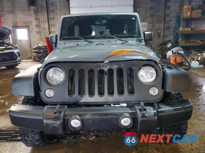 Piąte zdjęcie samochodu w środku: 2015 JEEP WRANGLER UNLIMITED SPORT VIN:1C4HJWDG0FL656264 - miniatura