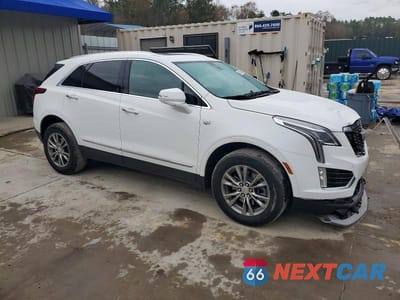 Czwarte zdjęcie samochodu z boku: 2023 CADILLAC XT5 PREMIUM LUXURY VIN:1GYKNCR41PZ126210 - miniatura