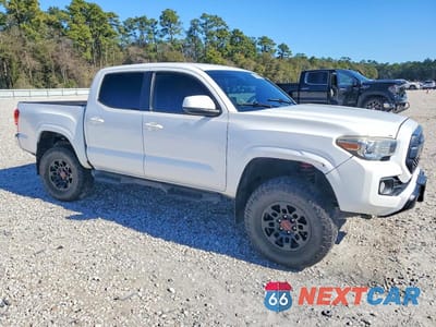 Czwarte zdjęcie samochodu z boku: 2017 TOYOTA TACOMA SR5 VIN:5TFAX5GN5HX090442 - miniatura