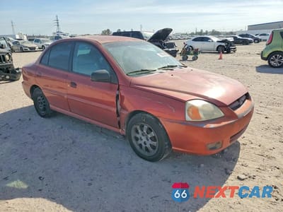 Czwarte zdjęcie samochodu z boku: 2003 KIA RIO VIN:KNADC125236242813 - miniatura