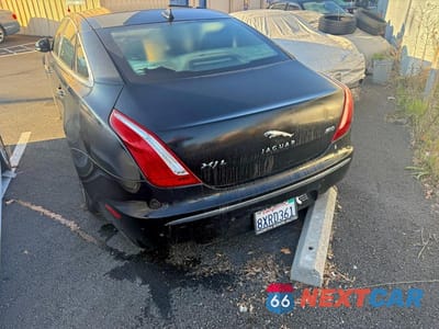 Trzecie zdjęcie samochodu z tyłu: 2013 JAGUAR XJL PORTFOLIO VIN:SAJWA2GB2DLV42961 - miniatura