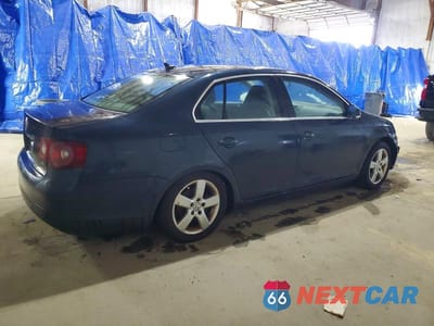 Trzecie zdjęcie samochodu z tyłu: 2009 VOLKSWAGEN JETTA SE VIN:3VWRZ71K49M090475 - miniatura