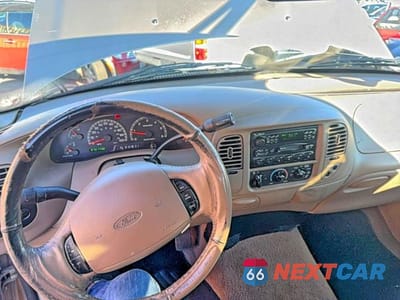 Zdjęcie 9 z 12 samochodu: 2001 FORD F150 VIN:1FTRX17L81NA76272 - miniatura
