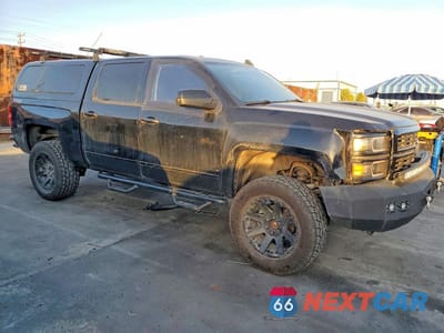 Czwarte zdjęcie samochodu z boku: 2015 CHEVROLET SILVERADO VIN:3GCUKREC1FG384202 - miniatura