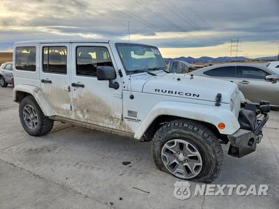 Czwarte zdjęcie samochodu z boku: 2017 JEEP WRANGLER UNLIMITED RUBICON VIN:1C4BJWFG7HL640830 - miniatura