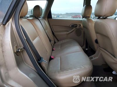 Zdjęcie 10 z 11 samochodu: 2003 FORD FOCUS SE VIN:1FAFP36313W234860 - miniatura