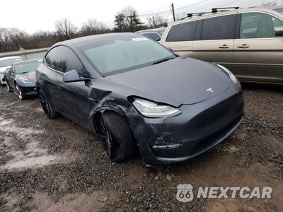 Czwarte zdjęcie samochodu z boku: 2021 TESLA MODEL Y VIN:5YJYGDEE3MF198638 - miniatura