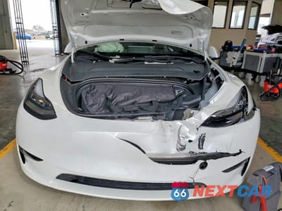 Piąte zdjęcie samochodu w środku: 2022 TESLA MODEL Y VIN:7SAYGDEE8NF504530 - miniatura