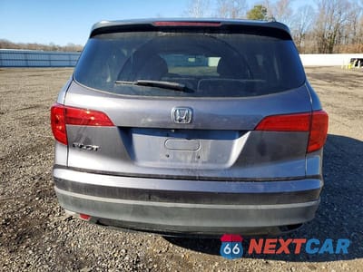 Zdjęcie 6 z 12 samochodu: 2018 HONDA PILOT LX VIN:5FNYF5H15JB014782 - miniatura