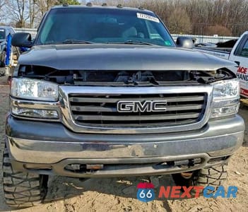 Piąte zdjęcie samochodu w środku: 2000 GMC NEW SIERRA K1500 VIN:1GTEK19TXYZ266006 - miniatura