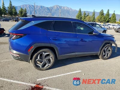 Trzecie zdjęcie samochodu z tyłu: 2022 HYUNDAI TUCSON VIN:5NMJECAE0NH075564 - miniatura