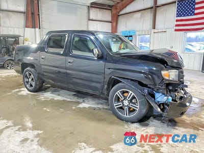 Czwarte zdjęcie samochodu z boku: 2014 HONDA RIDGELINE SPORT VIN:5FPYK1F72EB011444 - miniatura