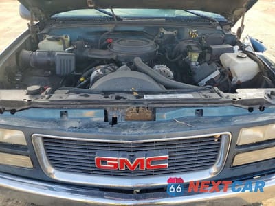 Zdjęcie 12 z 13 samochodu: 1995 GMC YUKON VIN:1GKEK13K3SJ764641 - miniatura