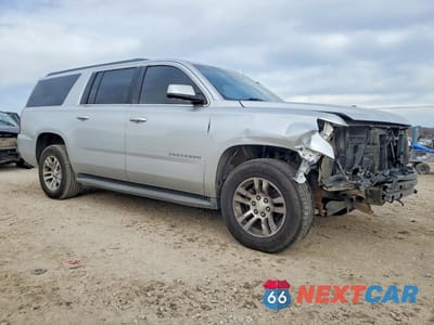 Czwarte zdjęcie samochodu z boku: 2016 CHEVROLET SUBURBAN C1500 LT VIN:1GNSCHKC5GR116913 - miniatura