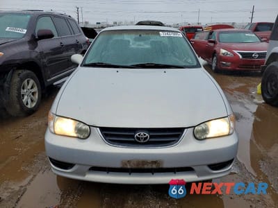 Piąte zdjęcie samochodu w środku: 2002 TOYOTA COROLLA CE VIN:1NXBR12E92Z598688 - miniatura