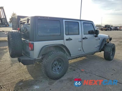 Trzecie zdjęcie samochodu z tyłu: 2014 JEEP WRANGLER UNLIMITED SAHARA VIN:1C4BJWEGXEL186926 - miniatura