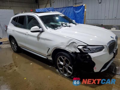 Czwarte zdjęcie samochodu z boku: 2022 BMW X3 VIN:5UX53DP07N9K02555 - miniatura