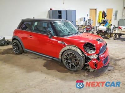Czwarte zdjęcie samochodu z boku: 2009 MINI COOPER S VIN:WMWMF73529TW82081 - miniatura