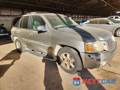 Czwarte zdjęcie samochodu z boku: 2002 GMC ENVOY VIN:1GKDT13S022445118 - miniatura