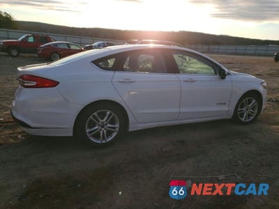 Trzecie zdjęcie samochodu z tyłu: 2018 FORD FUSION SE HYBRID VIN:3FA6P0LU5JR162251 - miniatura