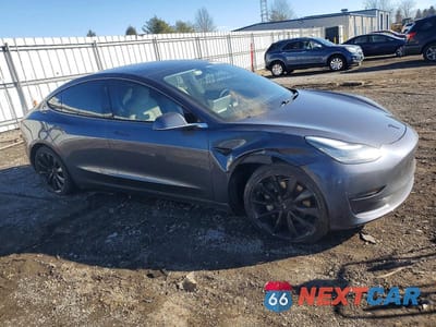 Czwarte zdjęcie samochodu z boku: 2020 TESLA MODEL 3 VIN:5YJ3E1EA0LF662611 - miniatura