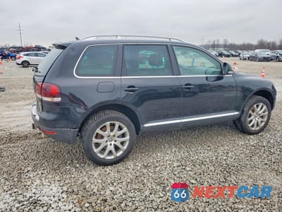 Trzecie zdjęcie samochodu z tyłu: 2009 VOLKSWAGEN TOUAREG 2 V6 VIN:WVGBE77LX9D001208 - miniatura