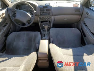 Zdjęcie 8 z 11 samochodu: 2001 TOYOTA COROLLA CE VIN:1NXBR12E31Z433234 - miniatura