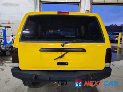 Zdjęcie 6 z 13 samochodu: 2001 JEEP CHEROKEE SPORT VIN:1J4FF48S91L591011 - miniatura