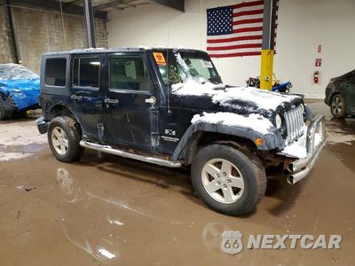 Czwarte zdjęcie samochodu z boku: 2009 JEEP WRANGLER UNLIMITED X VIN:1J4GA39109L727363 - miniatura