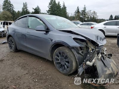 Czwarte zdjęcie samochodu z boku: 2021 TESLA MODEL Y VIN:5YJYGDEE7MF216932 - miniatura