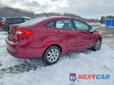 Trzecie zdjęcie samochodu z tyłu: 2011 FORD FIESTA SE VIN:3FADP4BJ1BM170481 - miniatura