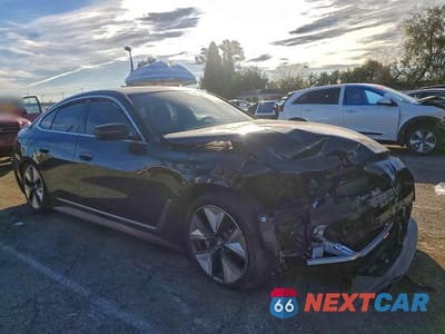 Czwarte zdjęcie samochodu z boku: 2024 BMW I4 EDRIVE 40 VIN:WBY73AW01RFS57616 - miniatura