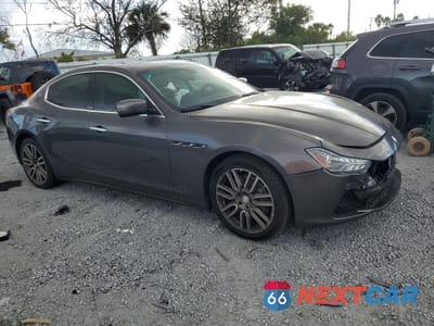 Czwarte zdjęcie samochodu z boku: 2015 MASERATI GHIBLI VIN:ZAM57XSA9F1134858 - miniatura