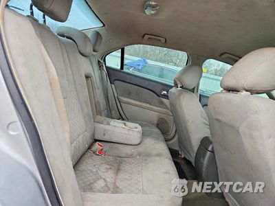 Zdjęcie 10 z 11 samochodu: 2012 FORD FUSION S VIN:3FAHP0GA7CR436075 - miniatura
