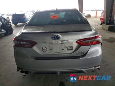 Zdjęcie 6 z 12 samochodu: 2022 TOYOTA CAMRY HYBRID XSE VIN:4T1K31AK3NU043894 - miniatura