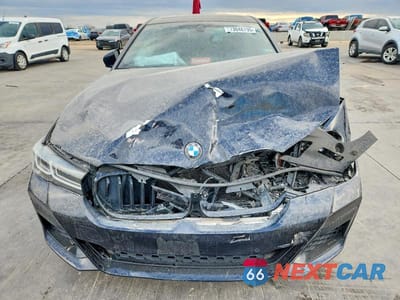 Piąte zdjęcie samochodu w środku: 2022 BMW M550XI VIN:WBA13BK05NCJ42318 - miniatura