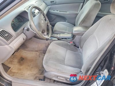 Zdjęcie 7 z 12 samochodu: 2002 TOYOTA CAMRY LE VIN:4T1BE32K02U060409 - miniatura