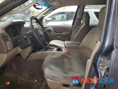 Zdjęcie 7 z 13 samochodu: 2003 JEEP GRAND CHEROKEE LAREDO VIN:1J8GW48S83C512384 - miniatura