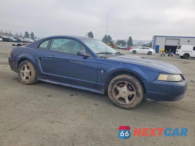 Czwarte zdjęcie samochodu z boku: 2001 FORD MUSTANG VIN:1FAFP40451F203311 - miniatura