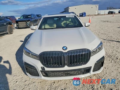 Piąte zdjęcie samochodu w środku: 2021 BMW 740 I VIN:WBA7T2C07MCF88819 - miniatura