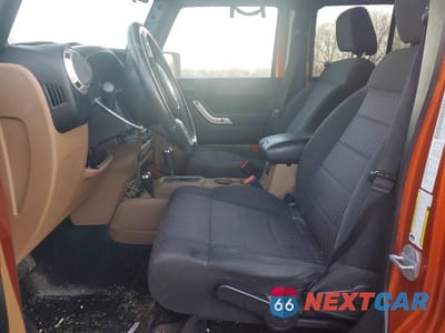 Zdjęcie 7 z 12 samochodu: 2011 JEEP WRANGLER UNLIMITED SAHARA VIN:1J4HA5H1XBL572649 - miniatura