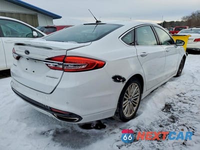 Trzecie zdjęcie samochodu z tyłu: 2017 FORD FUSION TITANIUM VIN:3FA6P0K91HR124071 - miniatura