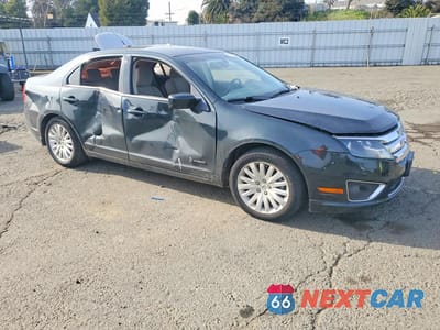 Czwarte zdjęcie samochodu z boku: 2010 FORD FUSION HYBRID VIN:3FADP0L32AR345654 - miniatura