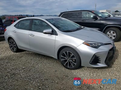 Czwarte zdjęcie samochodu z boku: 2017 TOYOTA COROLLA L VIN:5YFBURHE7HP650124 - miniatura