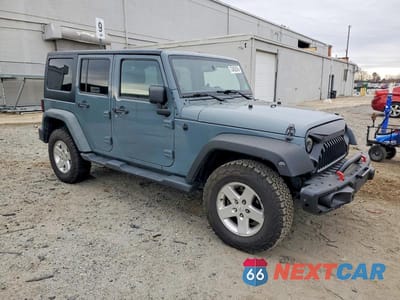 Czwarte zdjęcie samochodu z boku: 2014 JEEP WRANGLER UNLIMITED SPORT VIN:1C4BJWDG2EL126690 - miniatura